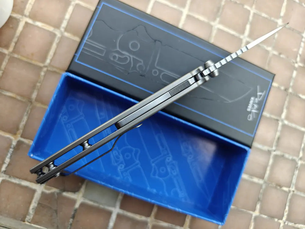 High-Performance Folding Knife — M390 Blade & Titanium Handle