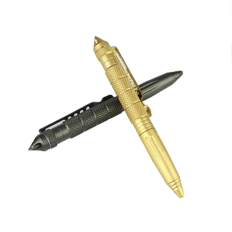 Gold and black tactical pen on a white background