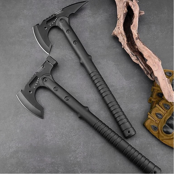 Two black axes with handles on a gray surface, next to a piece of wood and brown gloves. #RYTactical