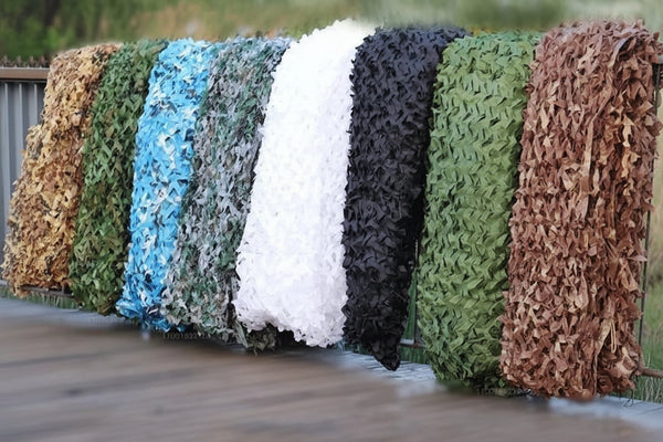 Military camouflage net in various colors with size specifications.