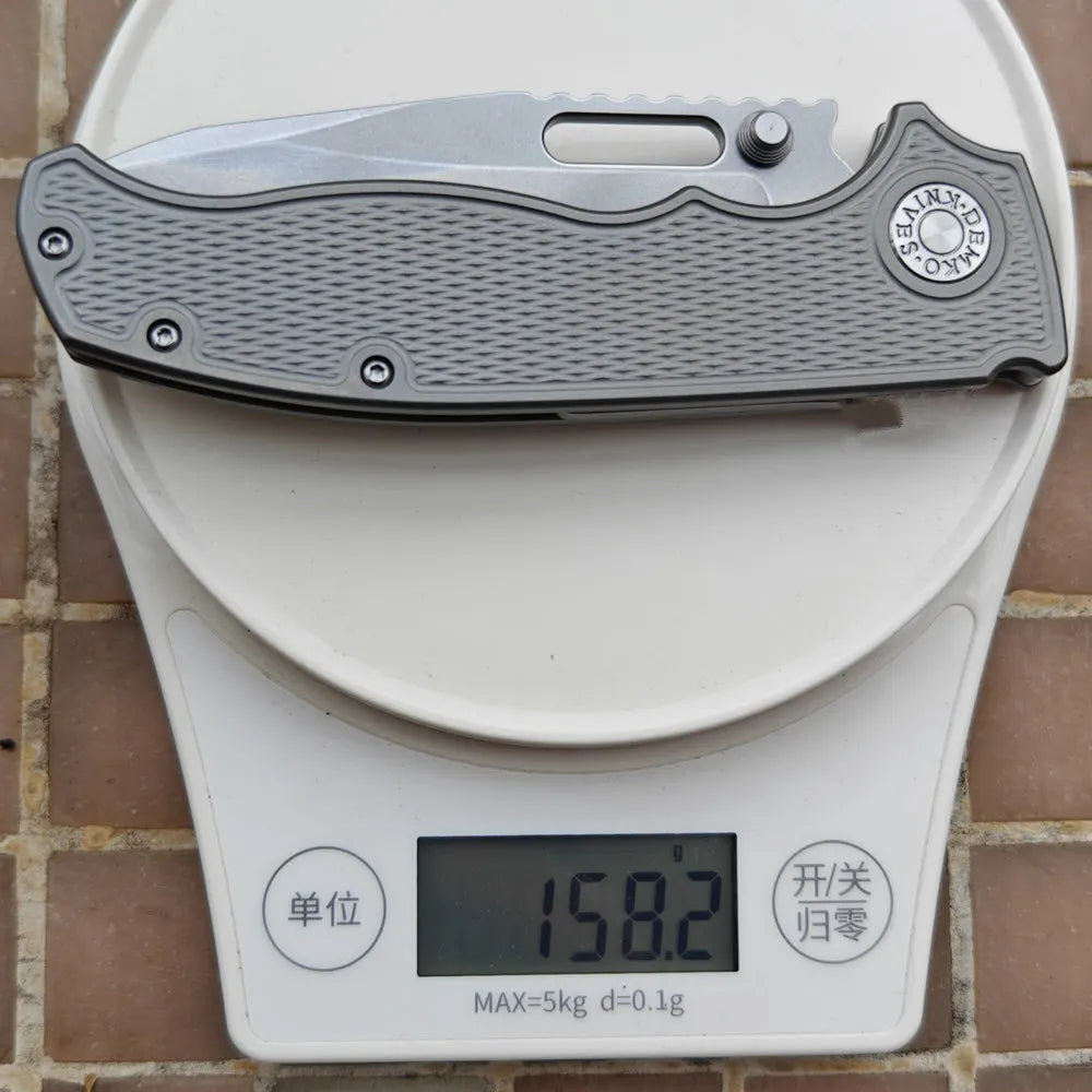 High-Performance Folding Knife — M390 Blade & Titanium Handle