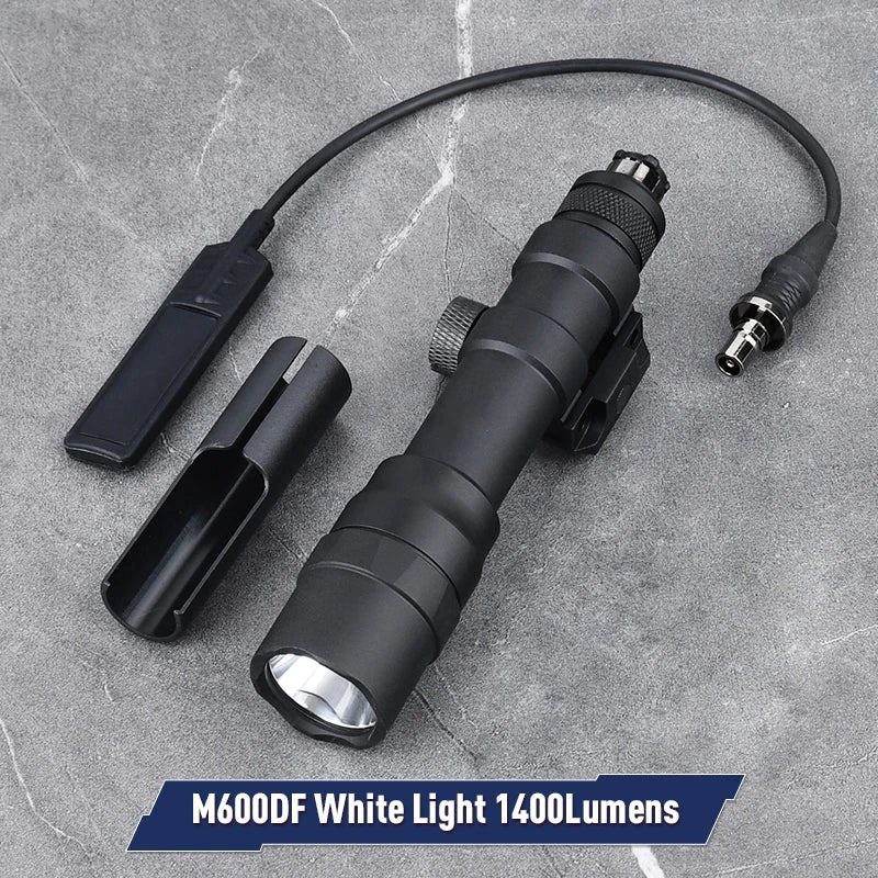 Black flashlight with attachments on a gray surface, labeled M600DF White Light 1400Lumens.